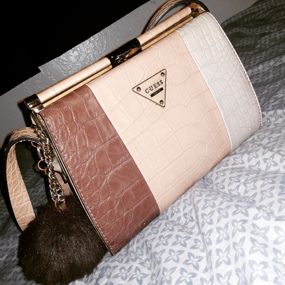 Guess purse with puff ball